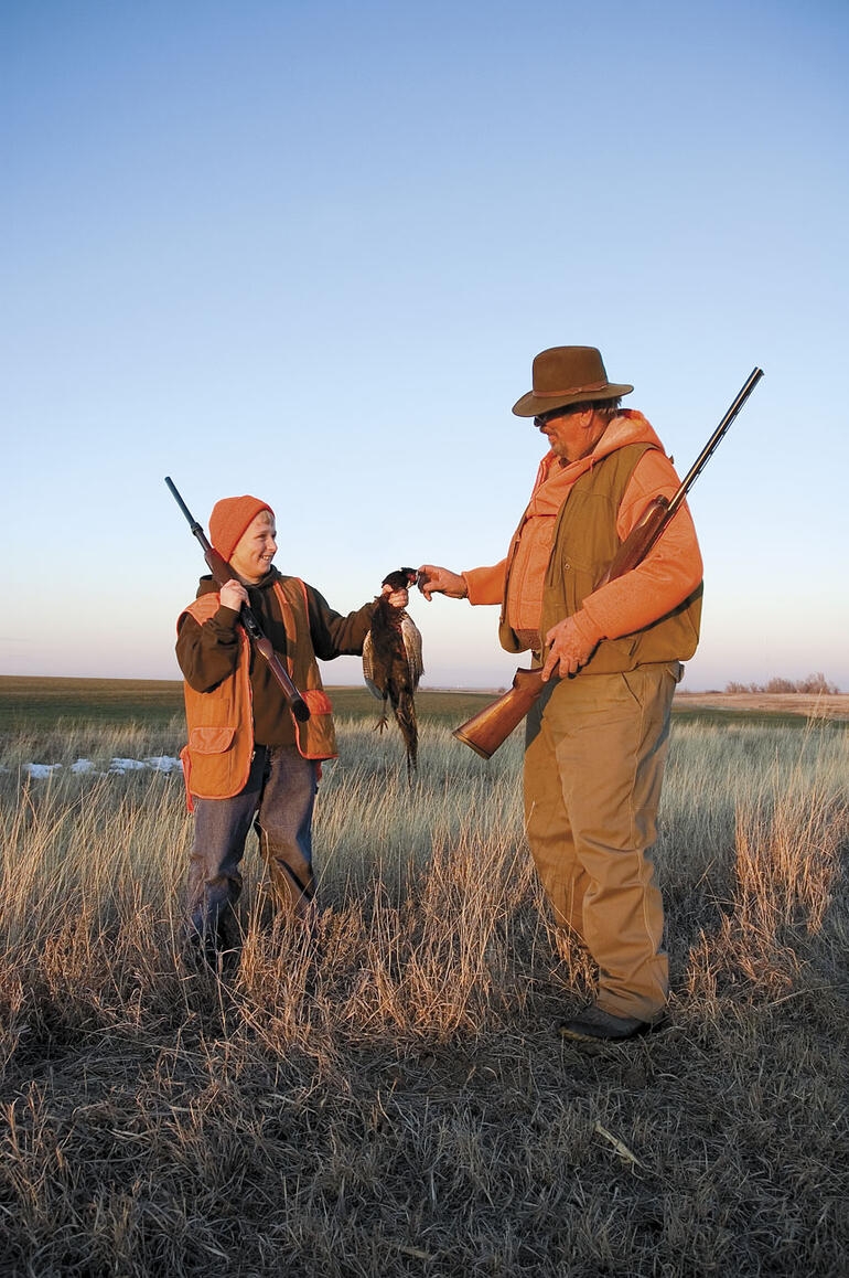 Kid and pheasant