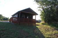 Elk Creek Cabin with Wakarusa Valley Cabin in the background. 