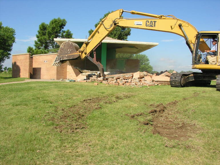 Old beach shower house during demolition